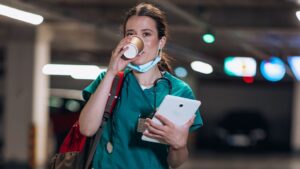 allied health jobs worker drinking coffee before night shift